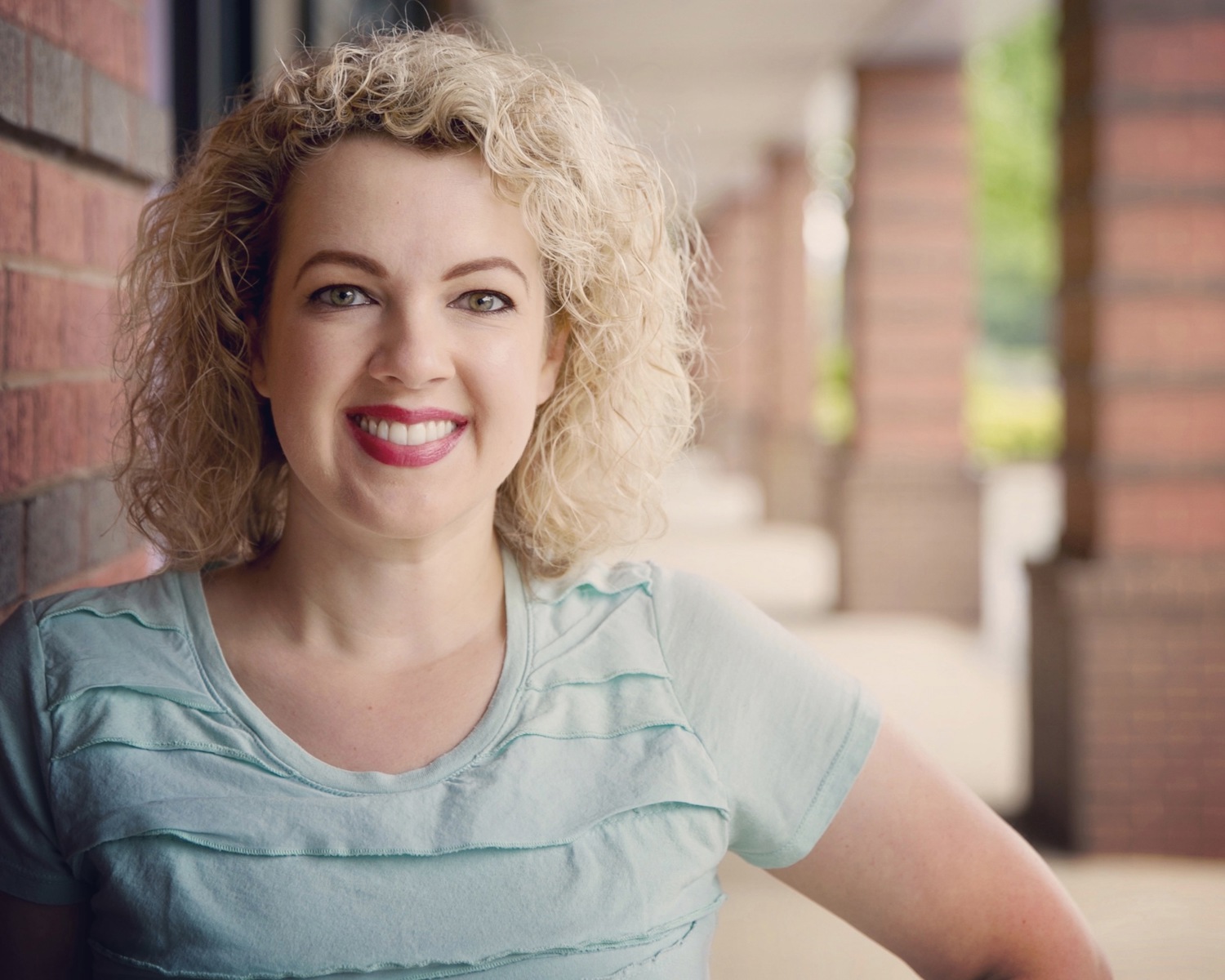 Abigail Haggard, Disney and cruise travel advisor, smiling portrait